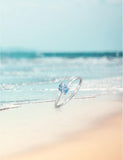 Bague en or blanc 9ct et topaze 412-44