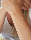 Bracelet deux anneaux en or jaune 9ct 440-35