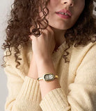Montre jonc Sloan doré + fond blanc