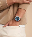 Machine chronographe cadran bleu et cuir brun