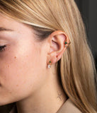 Piercing ZAG Oléron en acier doré