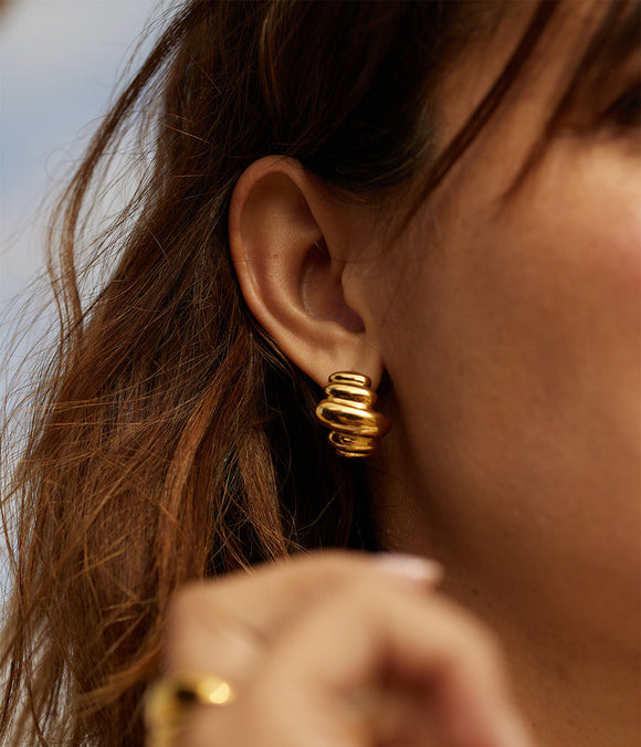 Boucles d'oreilles créoles ZAG Madeleine en acier doré
