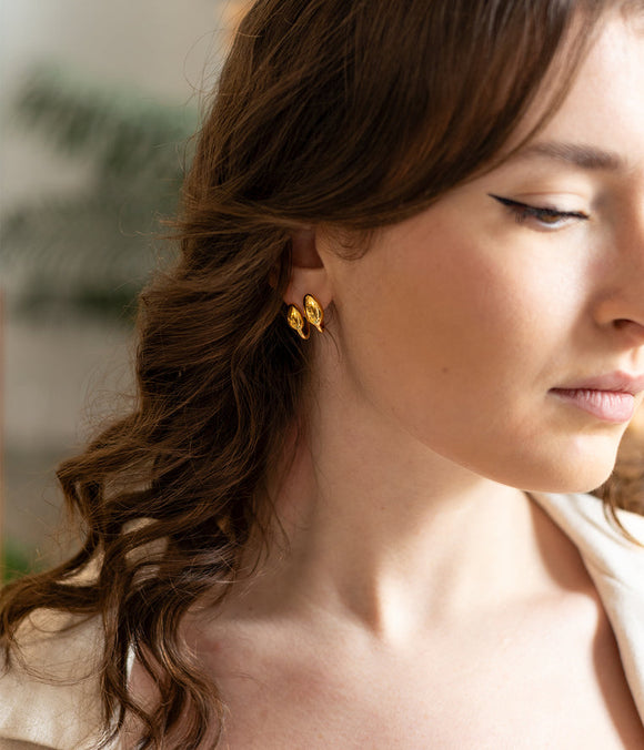 Boucles d'oreilles créoles ZAG Neuilly en acier doré
