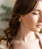 Boucles d'oreilles créoles ZAG Neuilly en acier doré