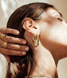 Boucles d'oreilles créoles ZAG Lafra en acier doré