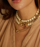 Collier triple ZAG Iguazu en acier doré