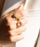 Bag Zag Cardi en acier doré