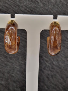 Créoles ZAG en acier doré et résine marron 880J798